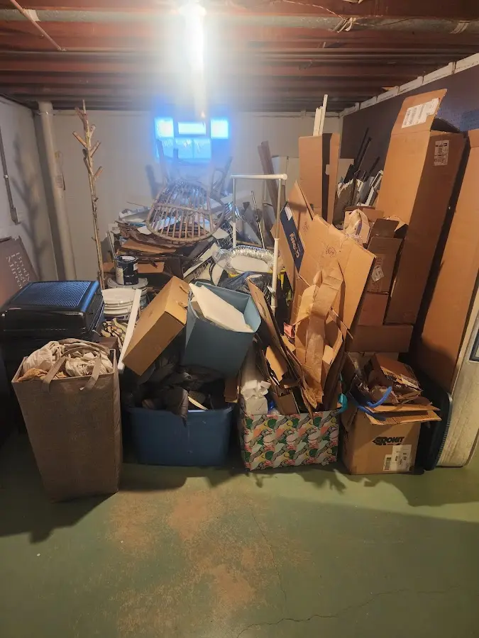 Roll-off dumpster container at job site for 4 Yard Dumpster Rental in Greenport